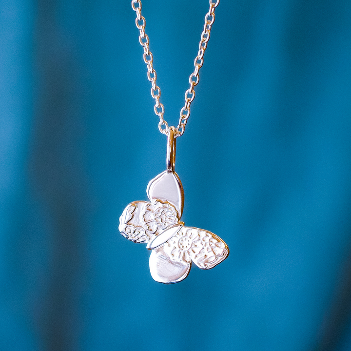Sterling silver butterfly necklace with lace detailing