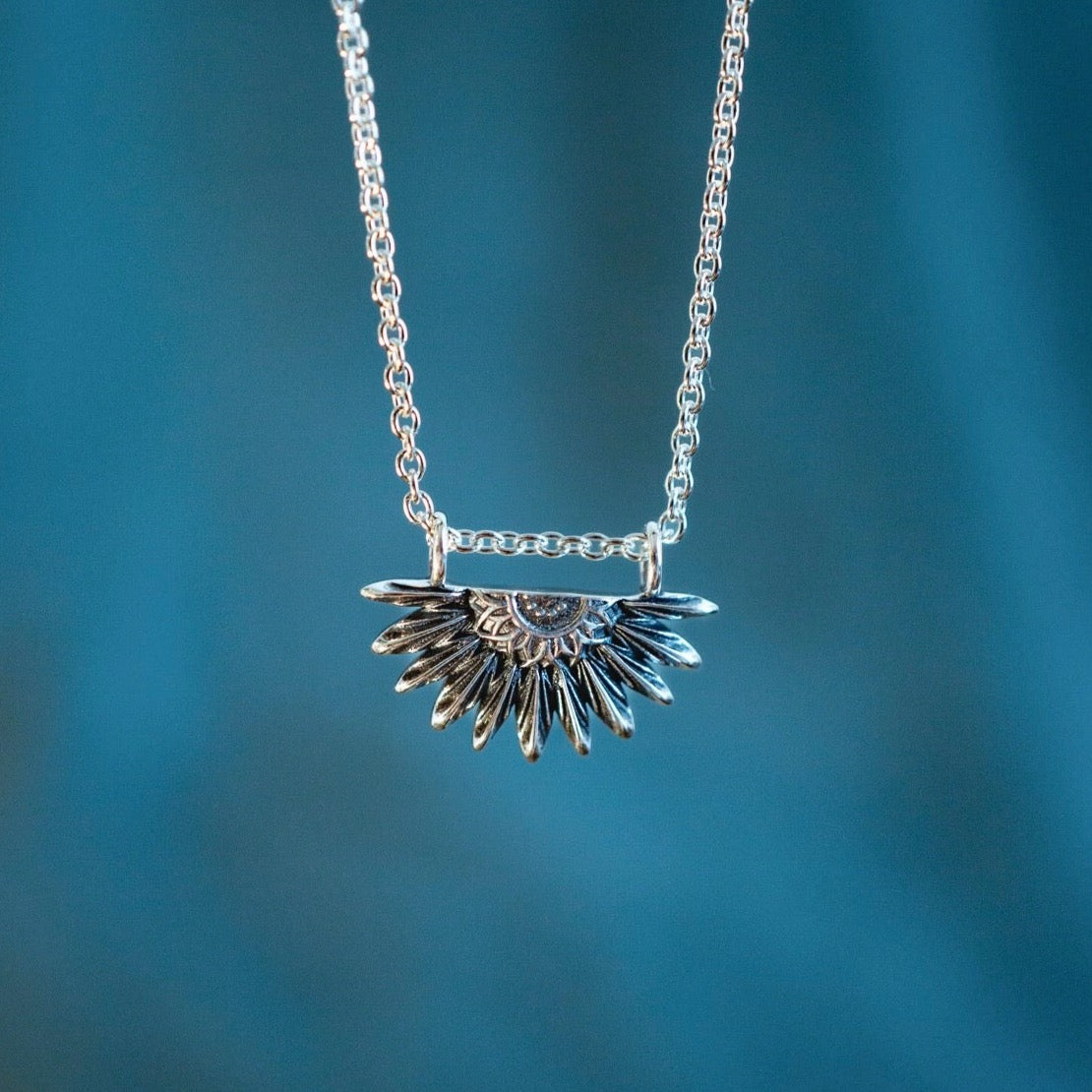 Silver sunflower pendant discount